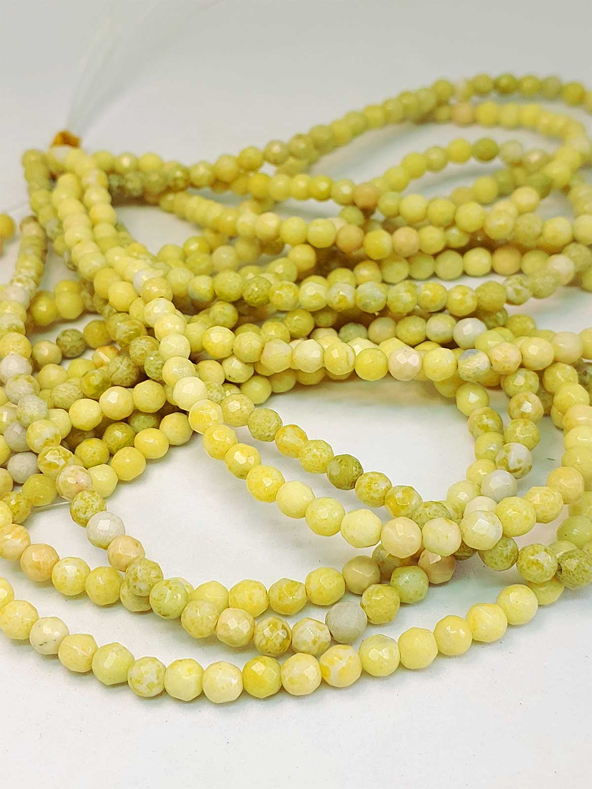 Peridot (Zebercet) Taşı Açık Yeşil-Beyaz Alacalı Faset Kesim Dizi 6mm - Görsel 3
